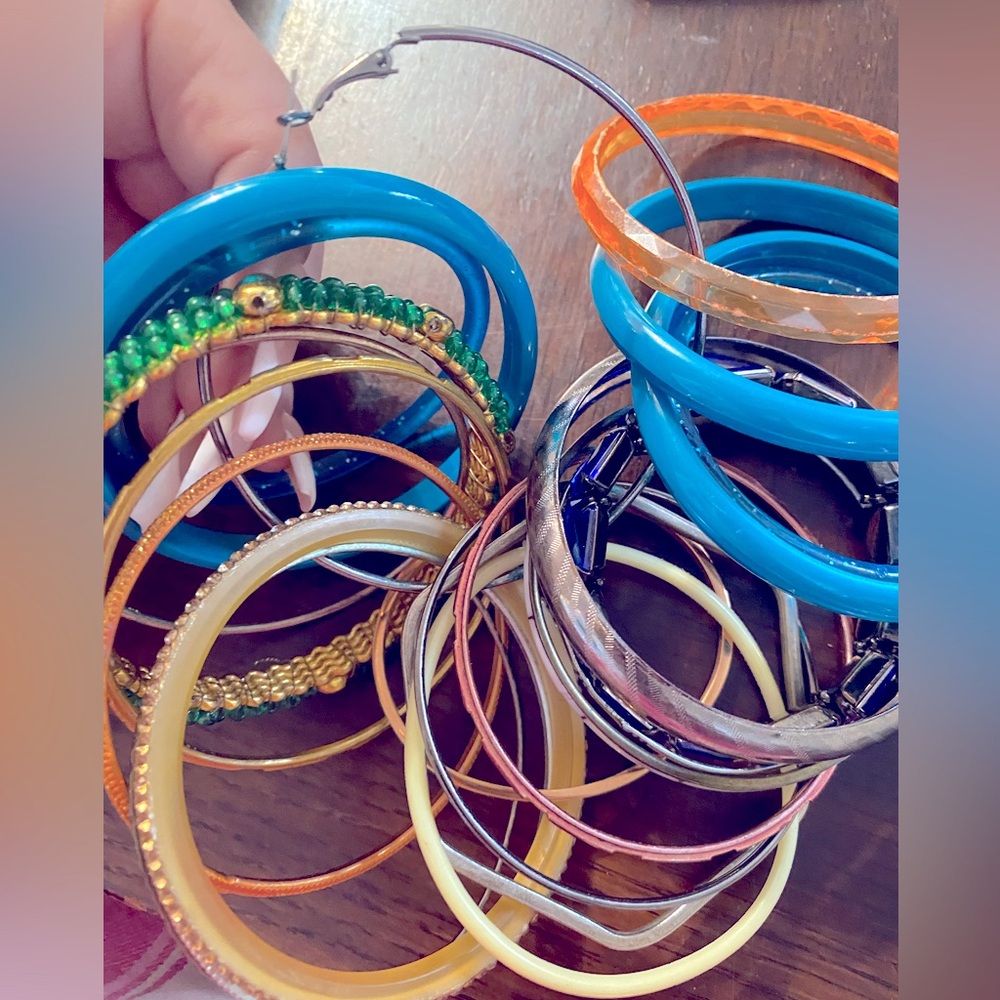 22 Mixed lot of ladies bangles various materials